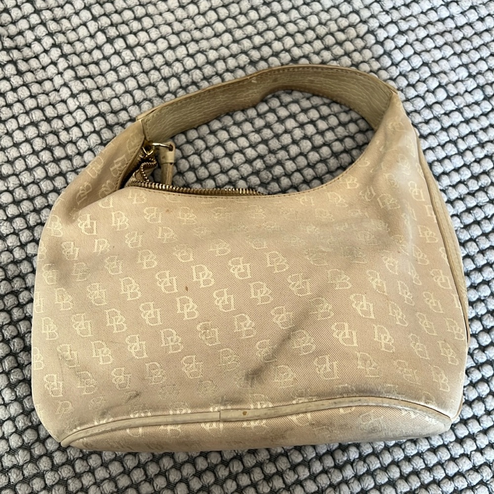 Very used doone and Burke bag